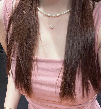 路路通项链.Pearl necklace: Akoya, 8.5-9mm, white base with pink overtones, round shape, very good luster, slightly imperfect. The necklace chain is made of 18K gold.