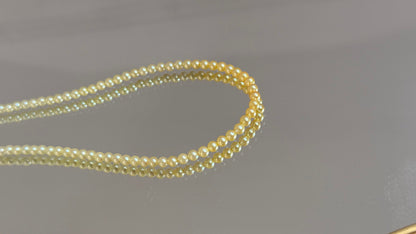 羽金黄渐变小米珠3-3.5mm